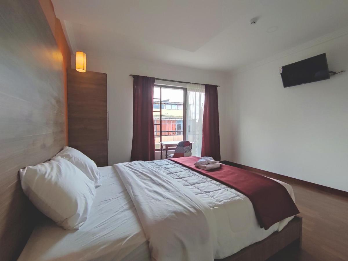 Hostal Nizza Cuenca Buitenkant foto